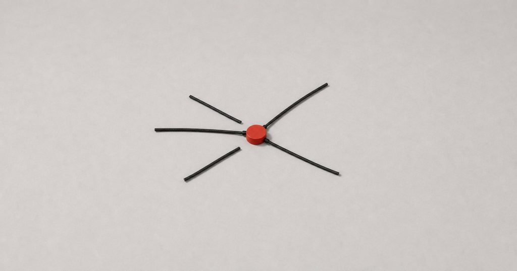 Several black threads converging on a single red marker, with some of the thread ends left unattached.